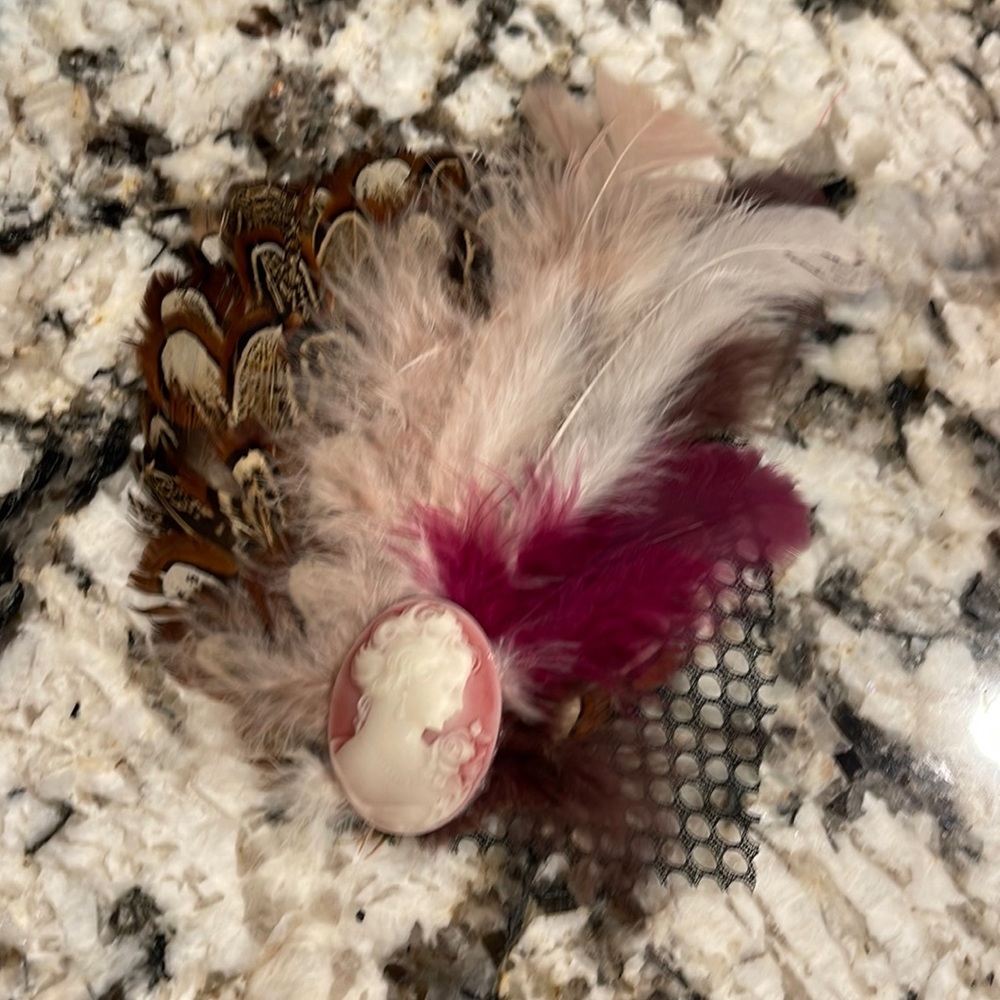 Fascinator style hair clip with cameo and feathers. Handmade.